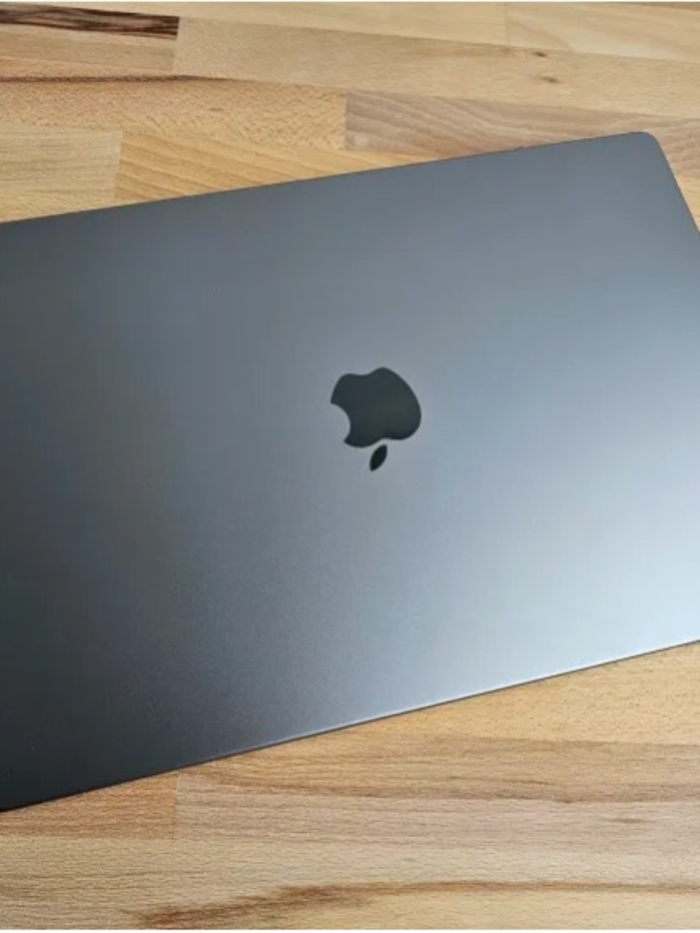 Apple MacBook in Space Gray with Apple Logo